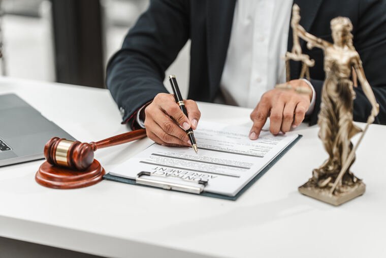 Attorney meeting with homeowners about a property insurance claim